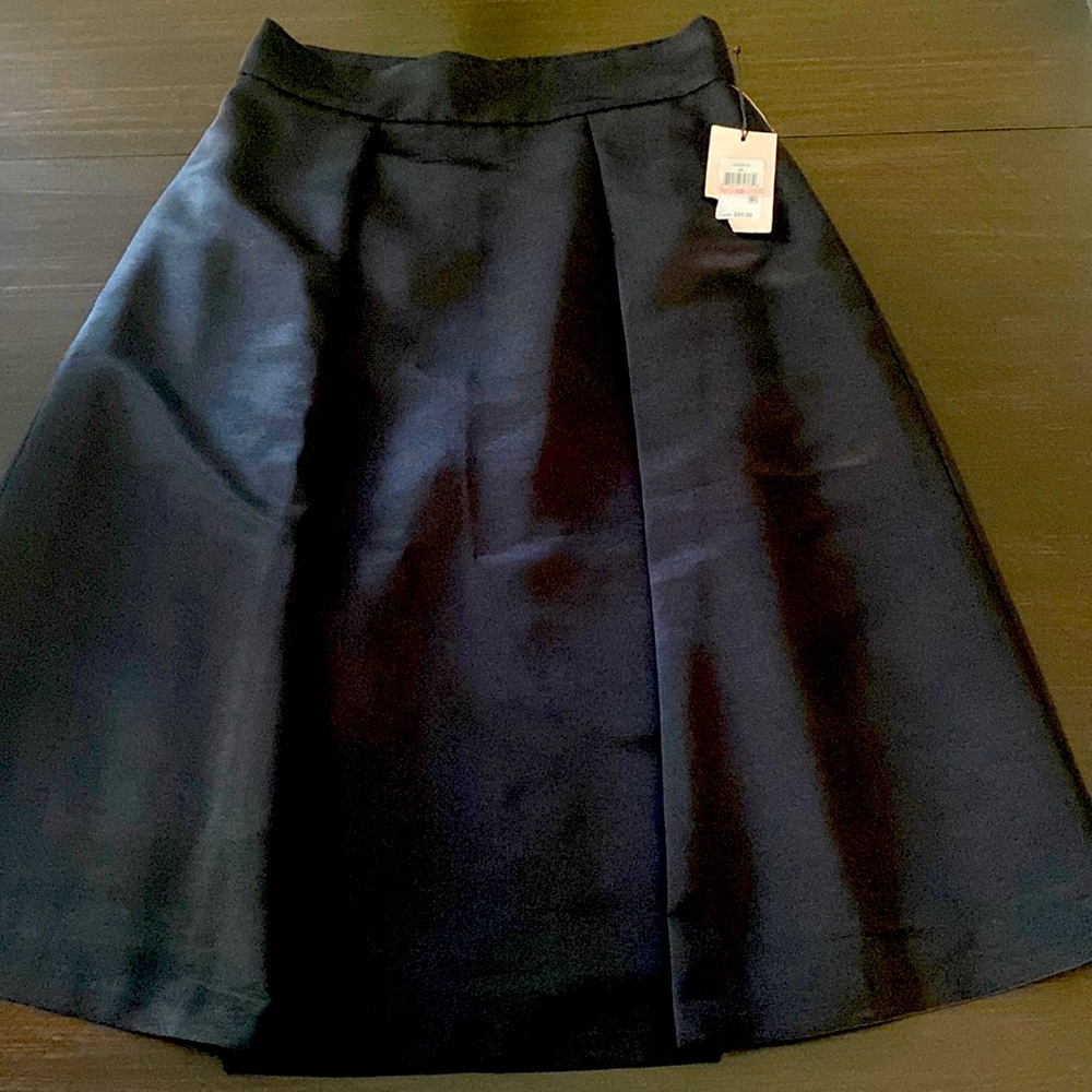 Black high waist A-line skirt. Very flattering! Open to offers!